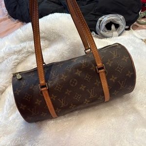 LV ROUND PURSE